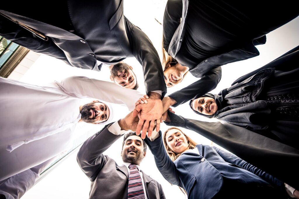 Arabic and western business people portrait. Motivational concep Arabic and western business people portrait. Motivational concept